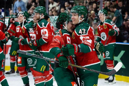 Arttu Ruotsalainen and Tom Nilsson of Frölunda celebrate