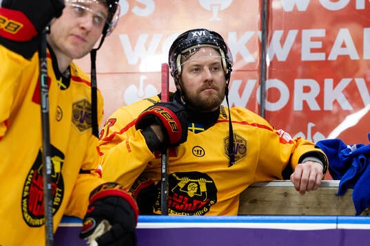 Anton Levtchi and Linus Omark of Luleå look dejected