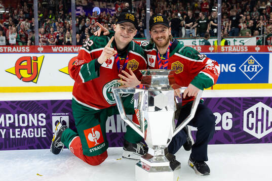 Filip Cederqvist and Erik Thorell celebrate with the trophy