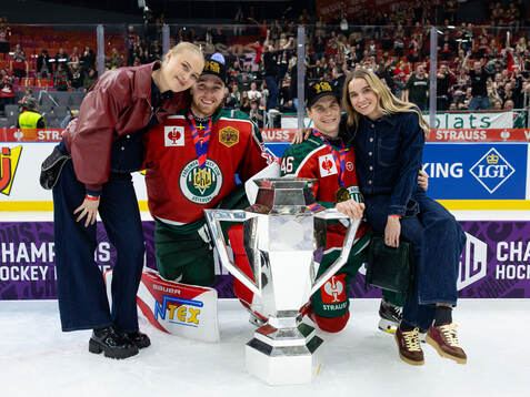 goaltender Tobias Normann and Dominik Egli of Frölunda and