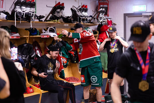 Goaltender Tobias Normann and Filip Cederqvist of Frölunda
