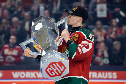 Tom Nilsson of Frölunda celebrates with the trophy