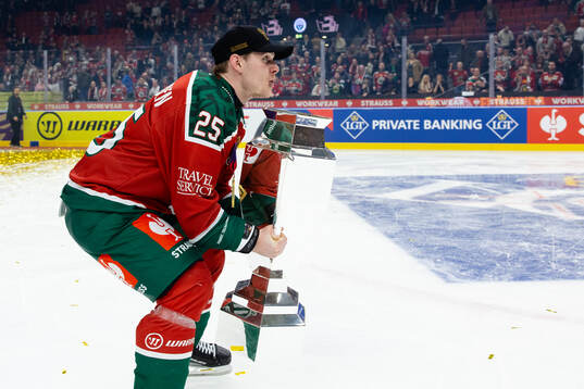 Arttu Ruotsalainen of Frölunda celebrates with the trophy