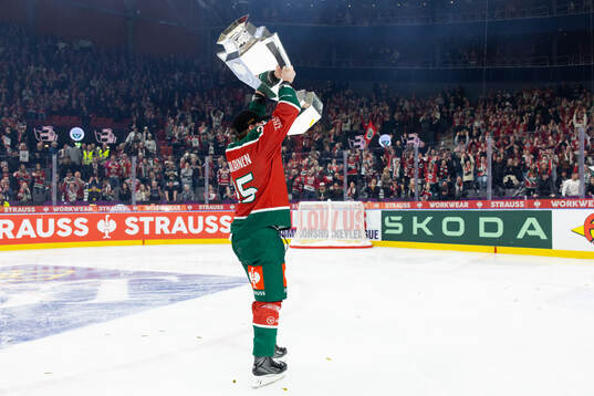 Arttu Ruotsalainen of Frölunda celebrates with the trophy