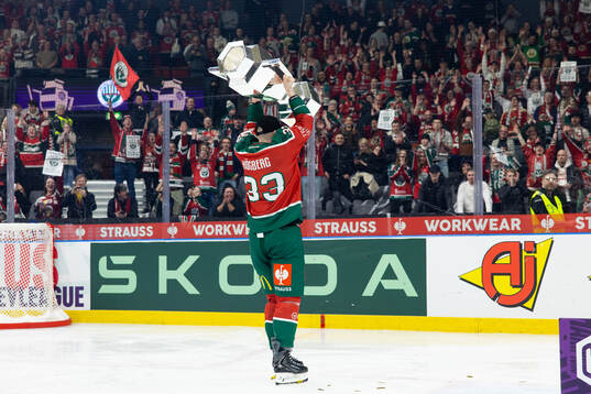 Linus Högberg of Frölunda celebrates with the trophy