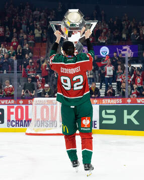 Filip Cederqvist of Frölunda celebrates with the trophy