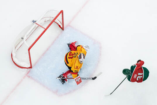 Nicklas Lasu of Frölunda scores 1-0 behind goaltender