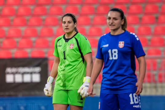 Goalkeeper Milica Kostic and Ema Petrovic of Serbia