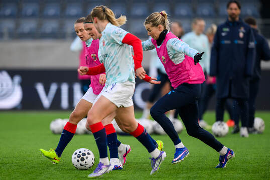 Signe Gaupset and Ada Hegerberg of Norway