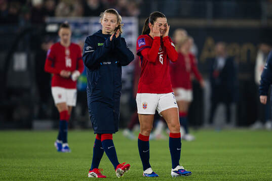 Justine Kielland and Tuva Hansen of Norway looks dejected