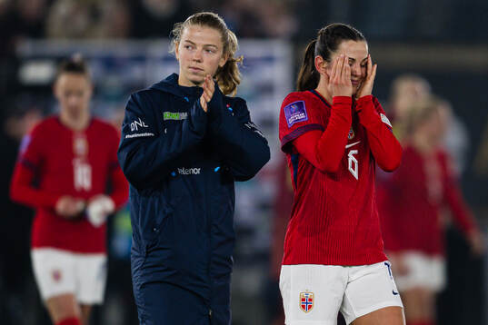 Justine Kielland and Tuva Hansen of Norway looks dejected