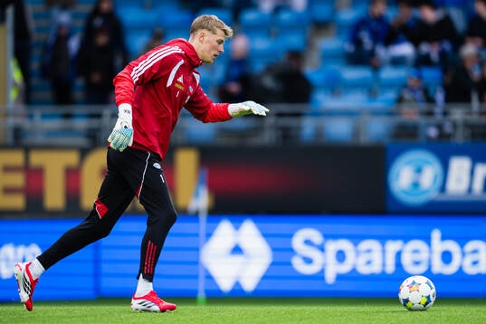 Goalkeeper Mads Kikkenborg of Molde warms up