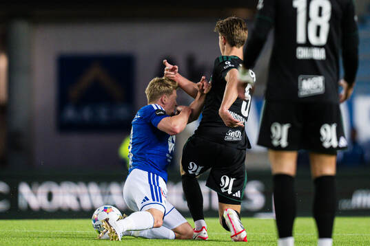 Kristian Eriksen of Molde and Håkon Volden of Rosenborg