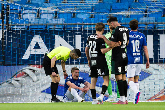 Kristian Eriksen of Molde in pain