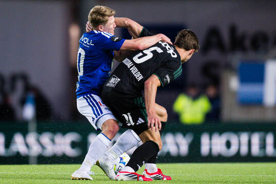 Kristian Eriksen of Molde and Håkon Volden of Rosenborg