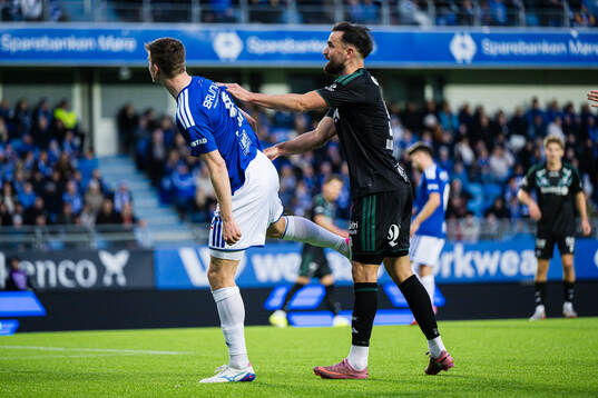 Sivert Sira Hansen of Molde and Dino Islamovic of Rosenborg