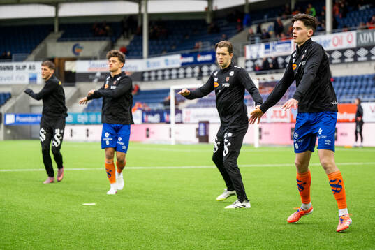 Henrik Melland and players of Aalesund