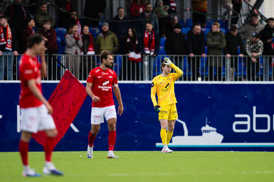 Goalkeeper Mathias Dyngeland of Brann looks dejected