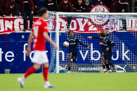 Promise Meliga of Kristiansund celebrates