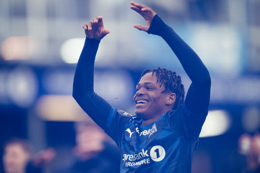 Promise Meliga of Kristiansund celebrates