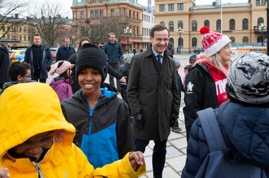 Statsminister Ulf Kristersson (M) besöker ett event