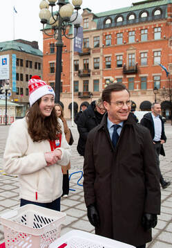 Linda Olovsson och Statsminister Ulf Kristersson (M)