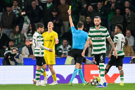 Ulrik Saltnes of Bodø/Glimt is shown a yellow card by