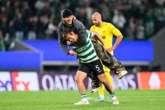 Hidemasa Morita of Sporting celebrates