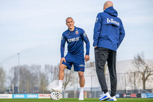 Leo Østigård and Ståle Solbakken, head coach of the