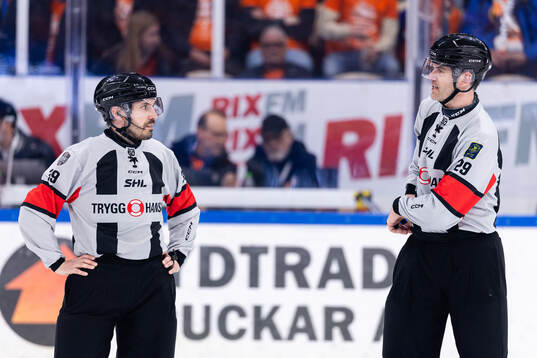 domare Mattias Enroth och domare Richard Magnusson