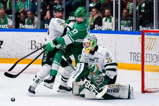 Färjestads Magnus Nygren och målvakt Melker Thelin samt
