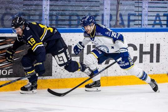 HV71s Niklas Hansson och Leksands Michael Lindqvist