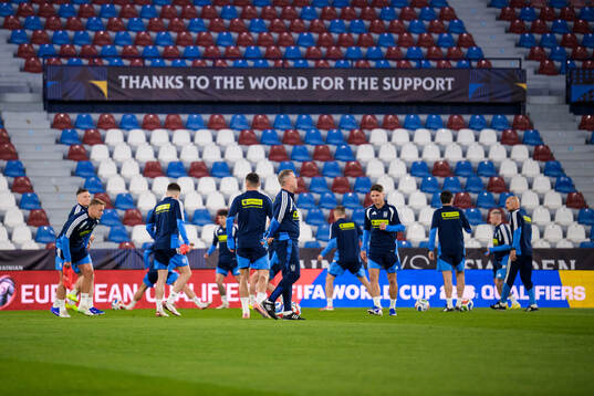 Head coach Serhiy Rebrov and players of the Ukrainian