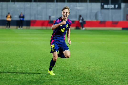 Yannick Geiger of Sweden celebrates