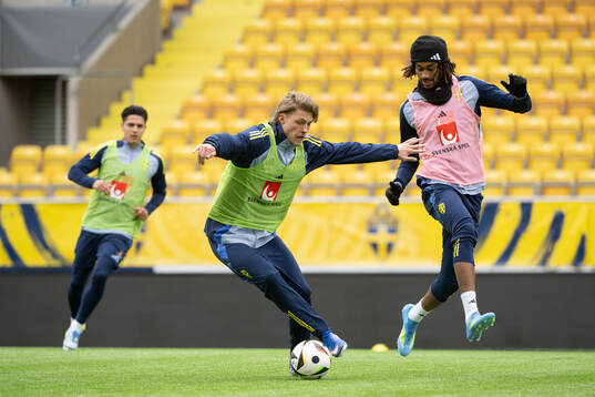 Lukas Björklund  and Jonah Kusi Asare of Sweden's U21