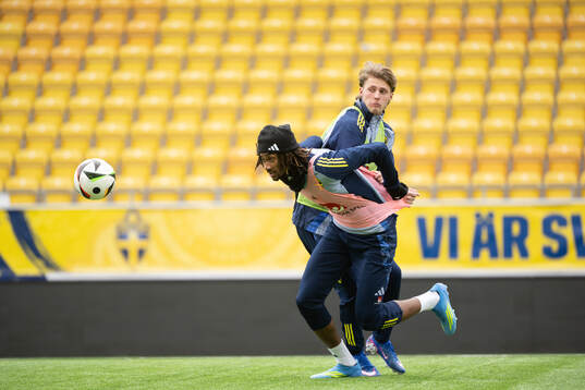 Jonah Kusi Asare and Lukas Björklund  of Sweden's U21