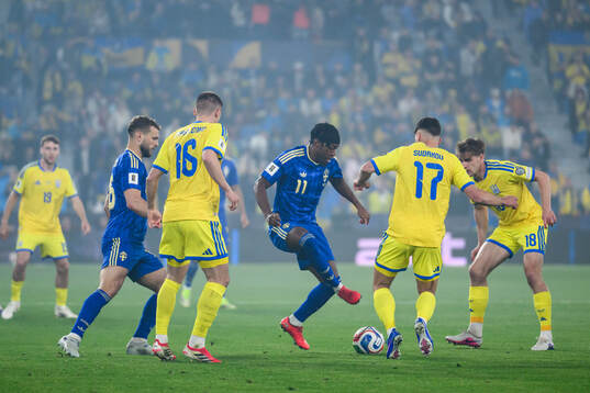 Jesper Karlström and Anthony Elanga of Sweden