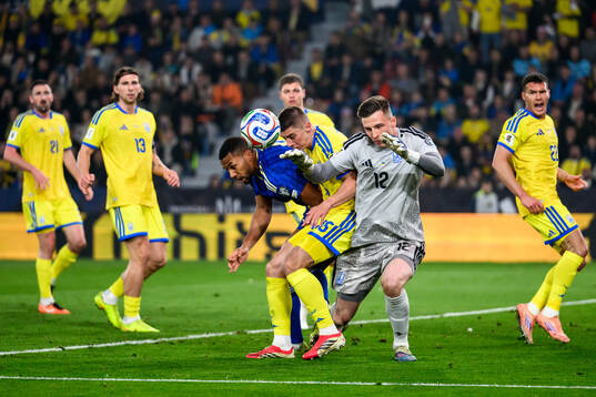 Isak Hien of Sweden against Vitaliy Mykolenko and