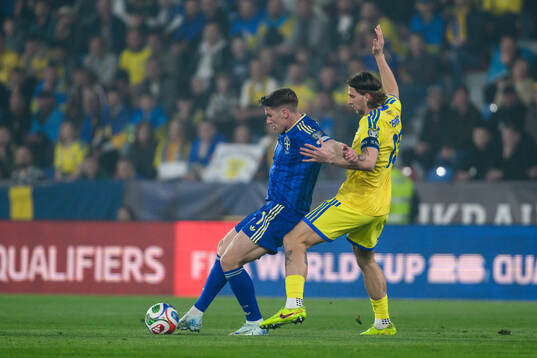 Viktor Gyökeres of Sweden and Illia Zabarnyi of Ukraine