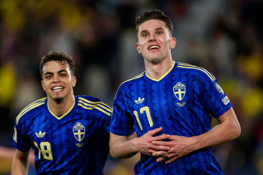 Yasin Ayari and Viktor Gyökeres of Sweden celebrate