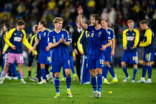 Daniel Svensson and Benjamin Nygren of Sweden celebrate