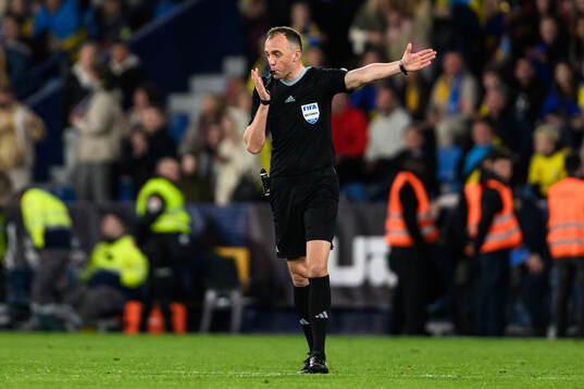 Referee Joao Pinheiro