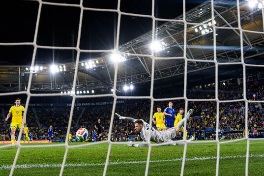 Viktor Gyökeres of Sweden scores the 0-2 goal behind