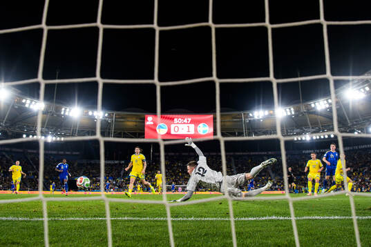 Goalkeeper Anatoliy Trubin of Ukraine lets in the 0-2 goal