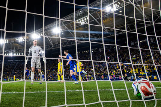 Goalkeeper Anatoliy Trubin of Ukraine looks dejected when