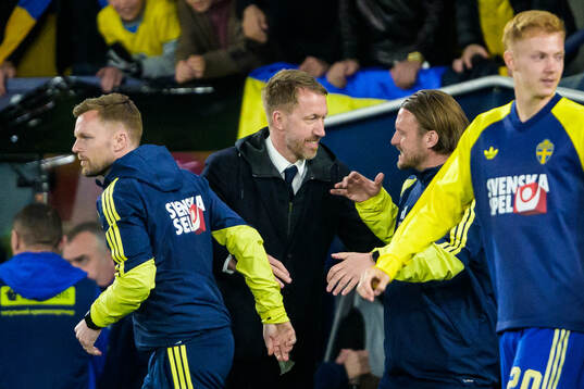 Assistant coach Sebastian Larsson, head coach Graham Potter
