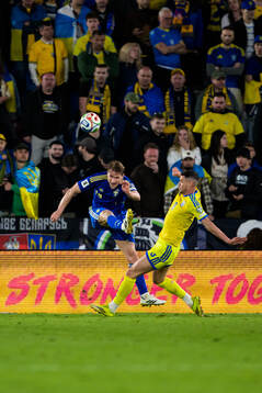 Carl Starfelt of Sweden and Roman Yaremchuk of Ukraine