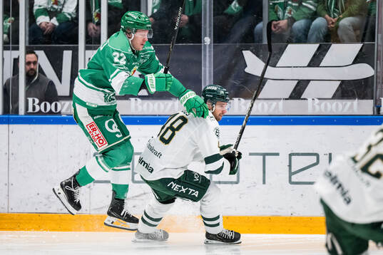 Rögles Fredrik Olofsson och Färjestads Filip Roos