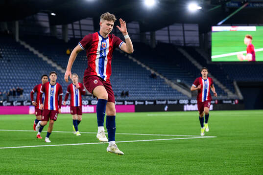 Sindre Walle Egeli of Norway celebrates the 1-0 goal