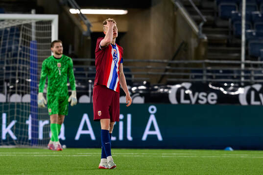 Rasmus Holten of Norway looks dejected